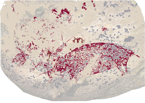 Peinture dans une grotte en Indonésie représentant probablement des figures humaines aux cotés d'un cochon